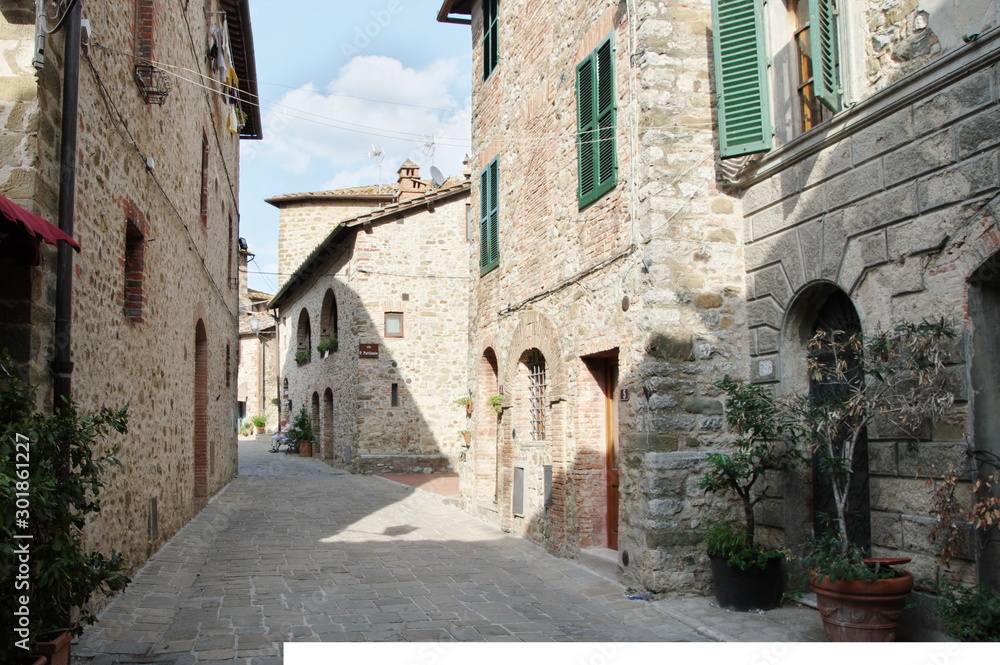 San Gusme, Tuscany, Italy - October 17, 2019: medieval village which is preserved in its original form until today. Typical buildings.