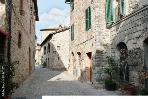 Fototapeta Naklejka Na Ścianę i Meble -  San Gusme, Tuscany, Italy - October 17, 2019: medieval village which is preserved in its original form until today. Typical buildings.