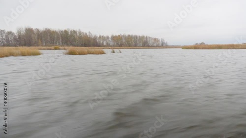 Autumn river, nature, view from the boat. Fishing. photo