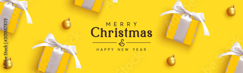 Holiday banner Merry Christmas and Happy New Year. Realistic yellow gifts boxes. Pattern with gift box with white bow. Xmas ornaments baubles balls. Horizontal festive poster, headers for website