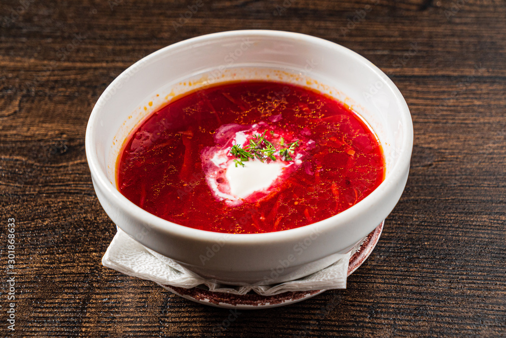 beetroot soup on the wooden background beetroot soup on the wooden background