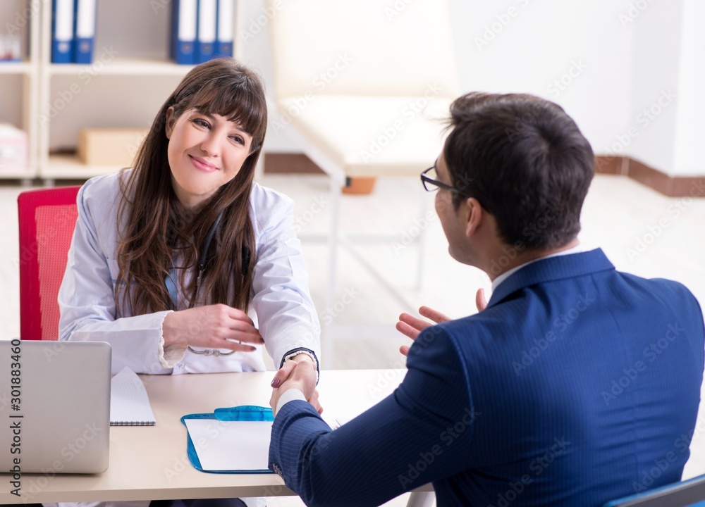 Man signing medical insurance contract Man signing medical insurance contract