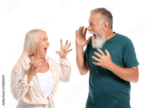 Angry senior couple shoutin...