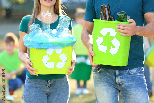 People holding containers w...