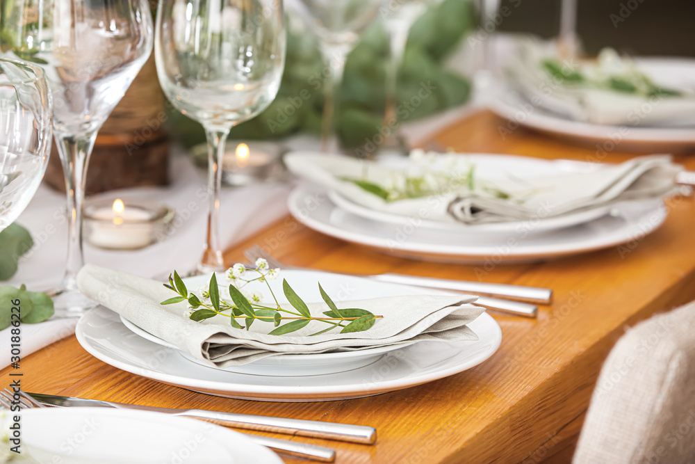 Beautiful table setting for wedding celebration in restaurant