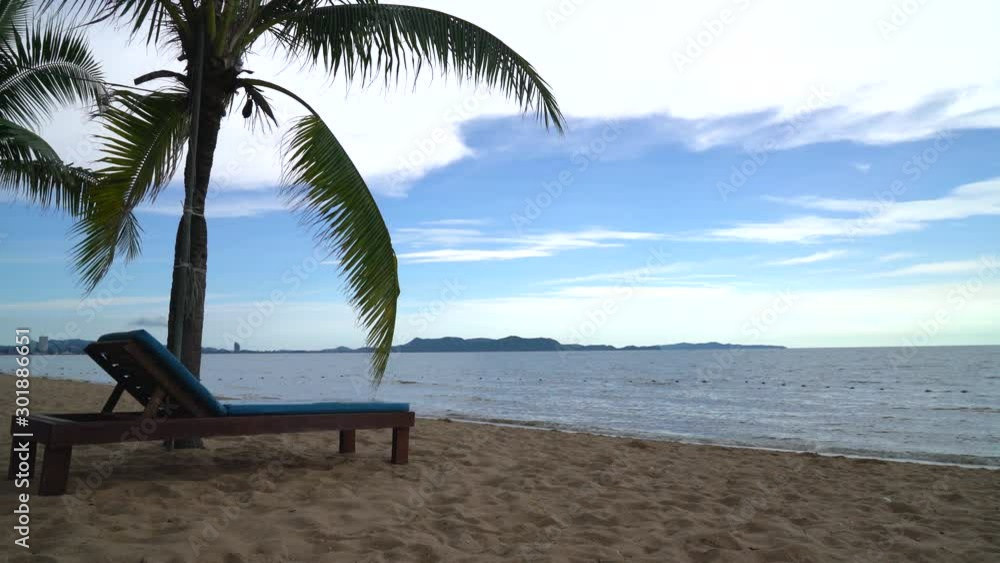 Beach chair, Palm and tropical beach at Pattaya in Thailand Beach chair, Palm and tropical beach at Pattaya in Thailand