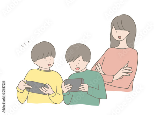 ゲームする子どもに注意する親