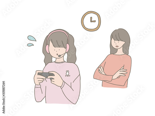 ゲームする子どもに注意する親