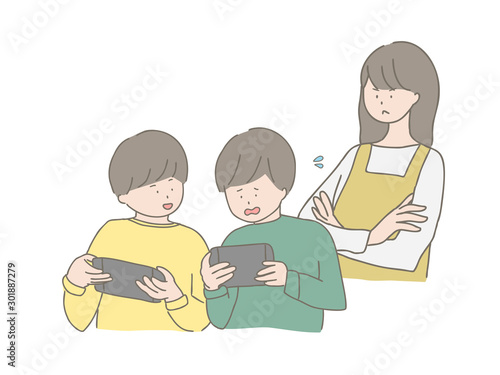 ゲームする子どもに注意する親