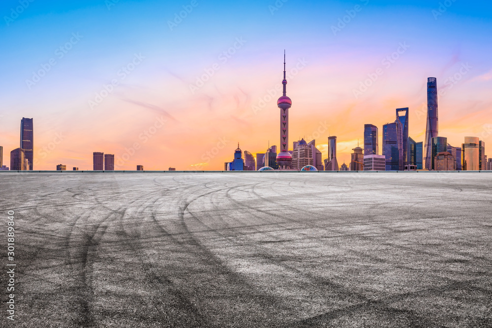 Sunset architectural landscape and asphalt road in Shanghai