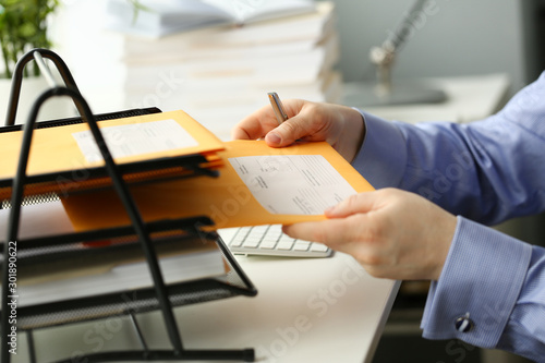 Slika na platnu Businessman hold hand yellow mail envelope