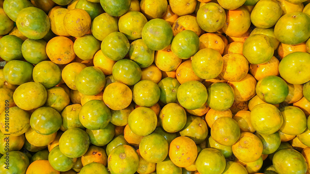 Many tangerines placed in the market