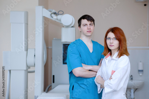 Male doctor and a nurse radiologists.