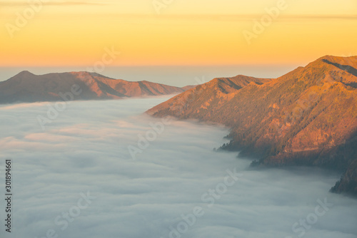 Beautiful view of the mountains with sea of fog in the area of Bromo Tengger Semeru National Park, Indonesia.