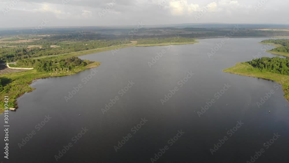 Drone shot aerial view scenic landscape of a reservoir dam at the countryside Drone shot aerial view scenic landscape of a reservoir dam at the countryside