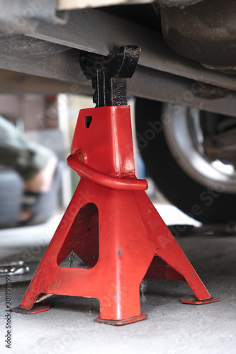 jack stand to lift up Extra safety measures are taken by using a hydraulic jack.