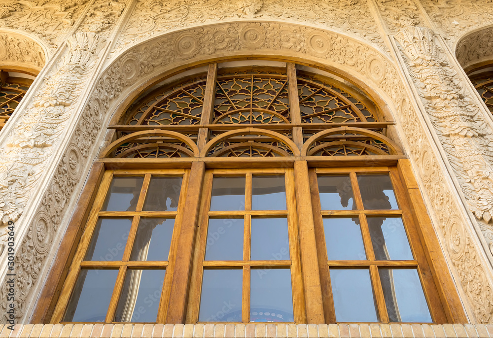 Renovated wooden arch window, Masoudieh historic mansion from Qajar dynasty, built in 1879, Tehran, Iran