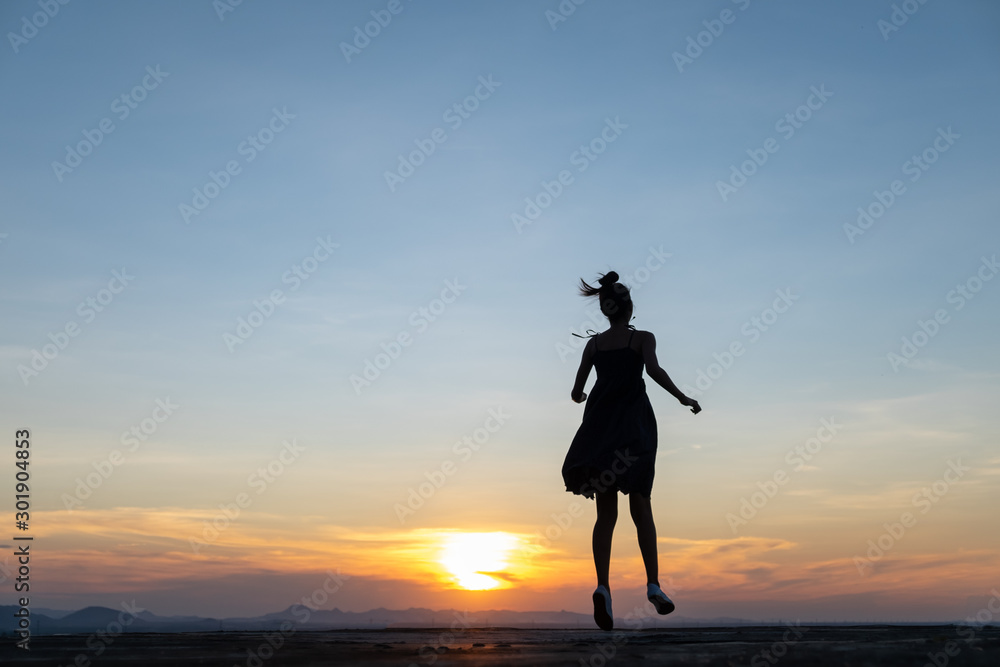 silhouette of a person runaway in the sunset