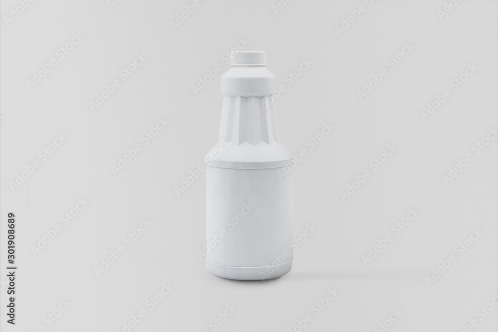 White plastic bottle isolated on soft gray background White plastic bottle isolated on soft gray background