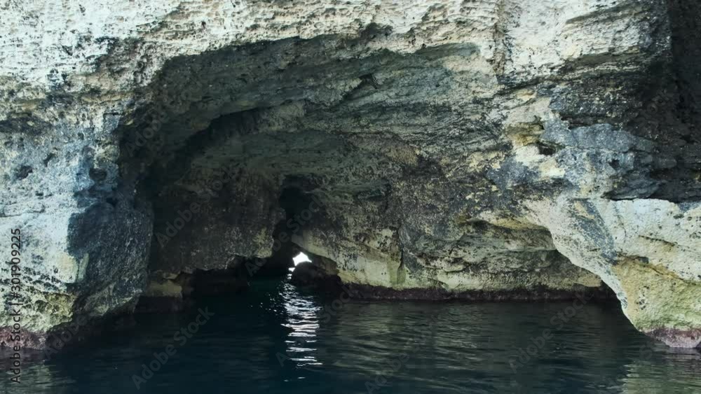 Cave inside seashore, shooting from the sea. Cave inside seashore, shooting from the sea.