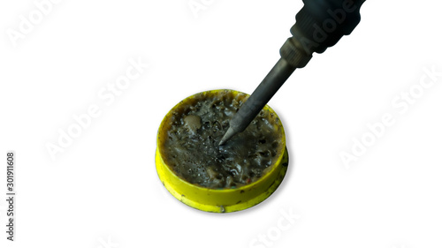 dirty soldering iron and solder flux isolated on white background.