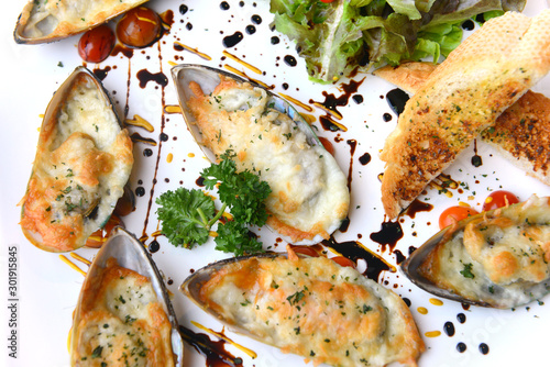 Seafood. Baked New Zealand Mussels with Cheese