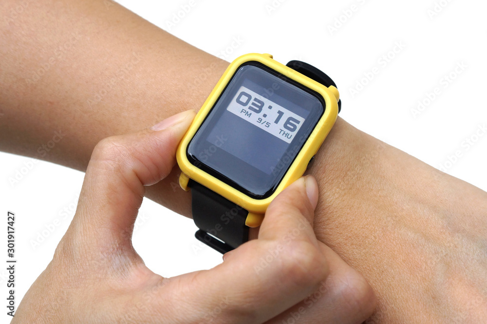 A woman using a smart watch isolated on white background A woman using a smart watch isolated on white background