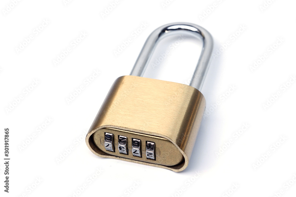 A brass padlock isolated on white background A brass padlock isolated on white background