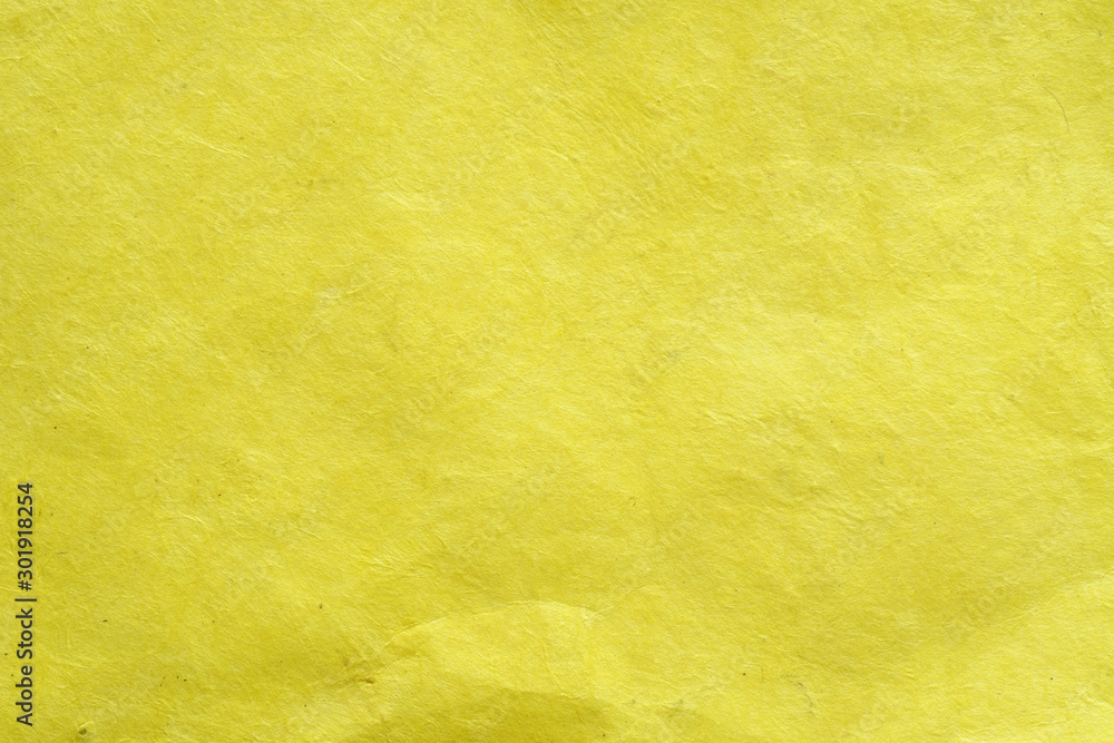 Obraz premium antique colored paper background texture. Colour of paper yellow