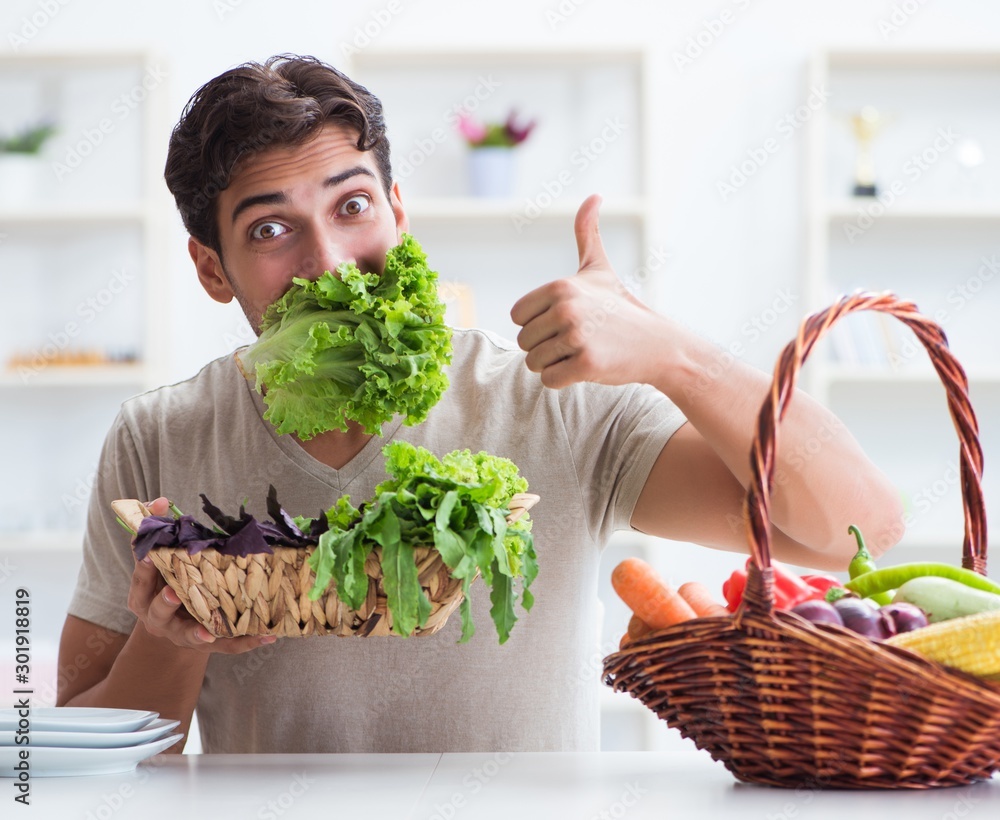 Young man in healthy eating and dieting concept Young man in healthy eating and dieting concept