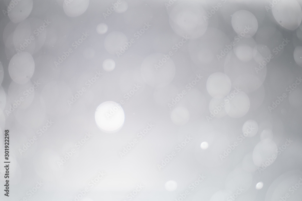 abstract blur or defocused lights bokeh on grey background abstract blur or defocused lights bokeh on grey background