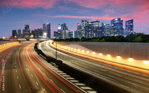 Photography Movement of car light with Singapore cityscape skyline during sunset