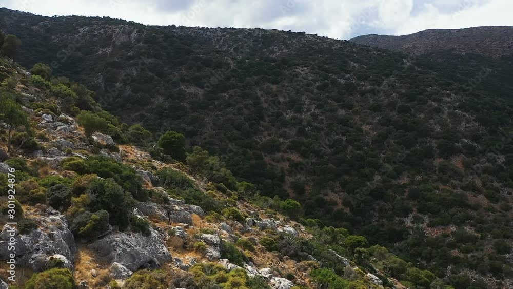 Greece. Drone flying above mountain serpentine road. Beautiful Nature landscape. Aerial video from drone flying over the bends of the mountain road on Crete. Greece. Greece. Drone flying above mountain serpentine road. Beautiful Nature landscape. Aerial video from drone flying over the bends of the mountain road on Crete. Greece.
