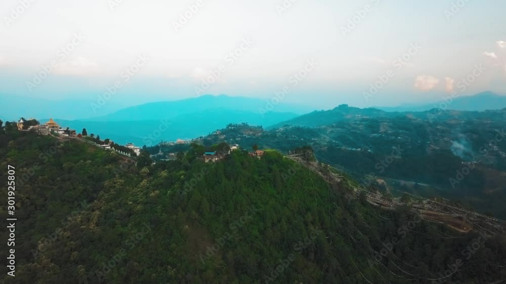 Ancient buddhist monastery in Himalayas Nepal from air Ancient buddhist monastery in Himalayas Nepal from air
