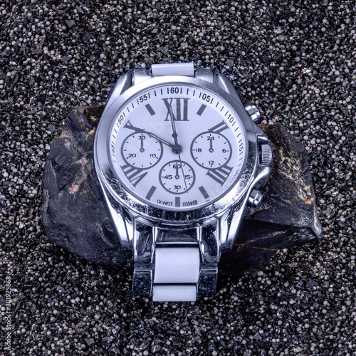 Wristwatch on the stone. Mechanical watches