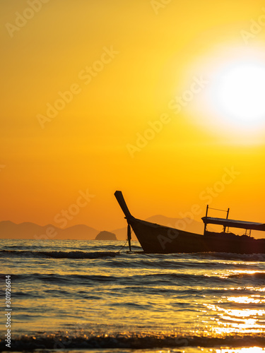 Traditional long-tail boat on the beach in Thailand