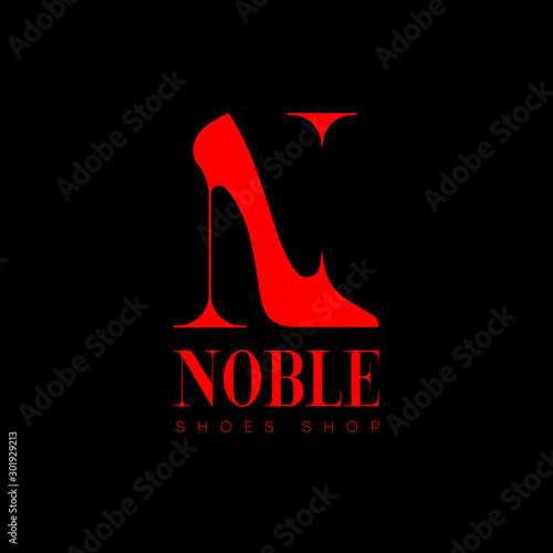 Noble logo. N monogram. Shoes shop emblem. Red female shoes with heel like N letter, isolated on a dark background. Premium brand.