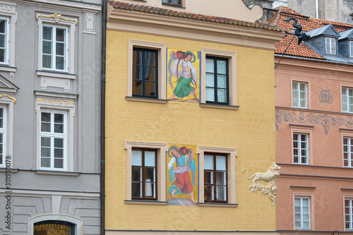 Old Town Market Place, decorative facade of tenement houses, Warsaw, Poland photo