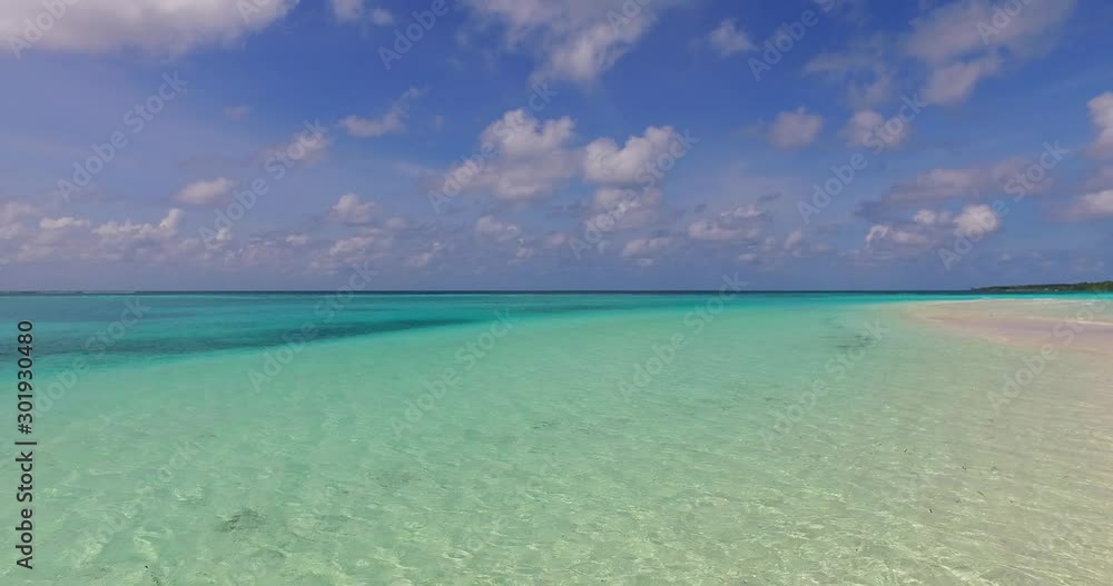 Stunning heaven with static clouds hanging over green turquoise lagoon with crystal vibrant seawater on bay of Barbados Stunning heaven with static clouds hanging over green turquoise lagoon with crystal vibrant seawater on bay of Barbados