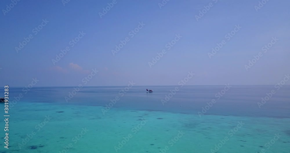 Fiji Island - Sea Plane Running In The Middle Of The Sea - Wide Shot Fiji Island - Sea Plane Running In The Middle Of The Sea - Wide Shot