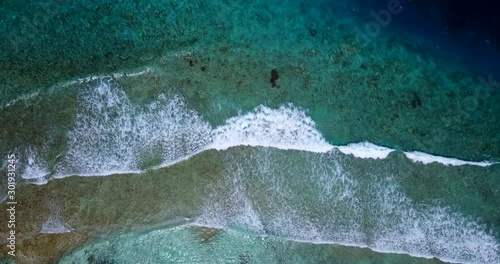 The Waves Of A Clear, Sparkling Beach Waters Of Australia - Aerial Shot photo