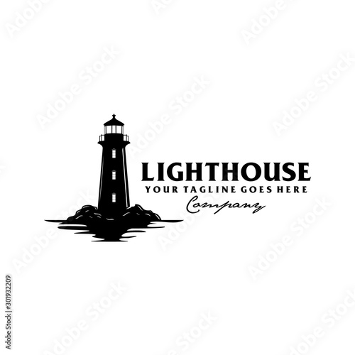 Lighthouse by the sea with ocean water