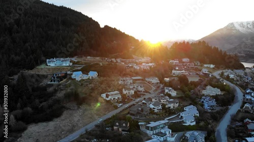 Scenic aerial view of Queenstown during sunrise.