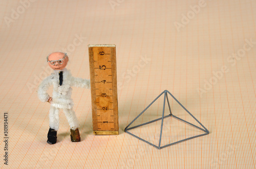 Solid Geometry presentation of a Pyramid, Each side is 4 cm. photo