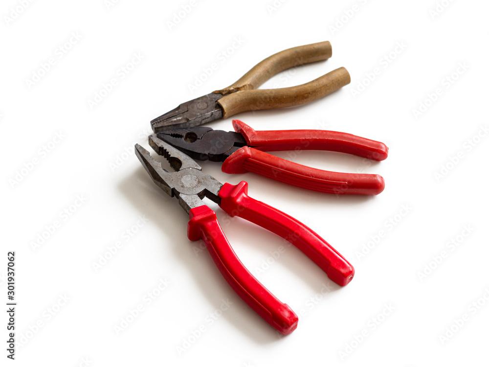 Pliers multifunctional hand-held mounting tool isolated on white background Pliers multifunctional hand-held mounting tool isolated on white background