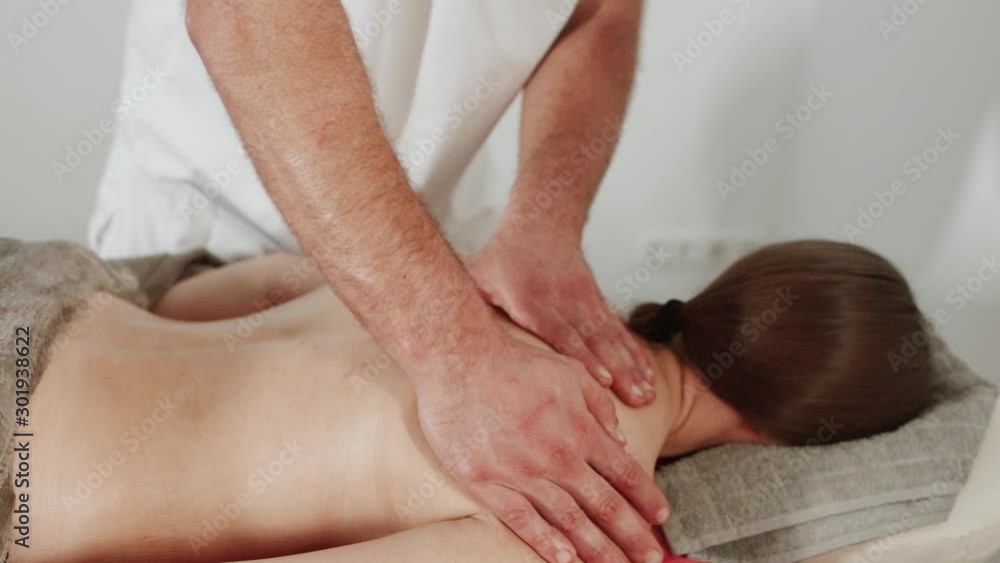 Massage concept. Beautiful young woman reciving relxing massage Massage concept. Beautiful young woman reciving relxing massage