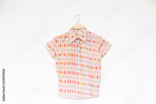 Woman summer blouse with pink blouse cotton on white background.
