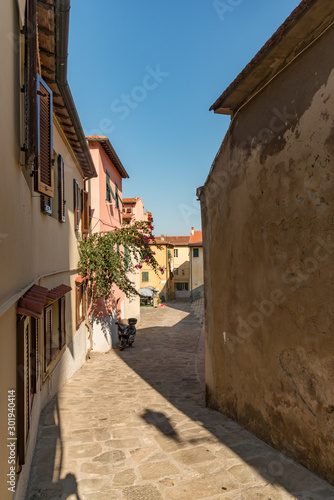 narrow street in old town of tuscany