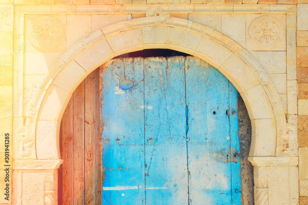 Cracked blue door in the house with Arabic ornaments, background. Sidi Bou  Said, Tunisia Stock Photo | Adobe Stock