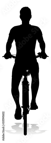 A bicycle riding bike cyclist in silhouette